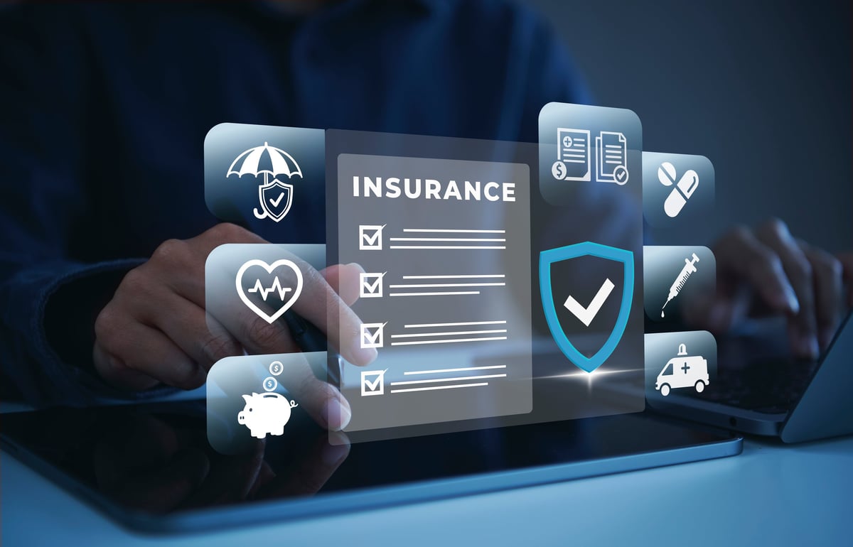 Business owner reviewing insurance policy coverage on a tablet